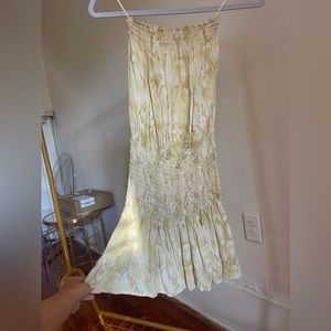 Yellow snake print smocked mini dress